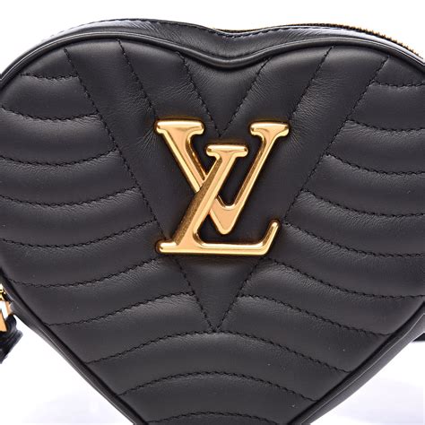 louis vuitton calfskin heart bag.